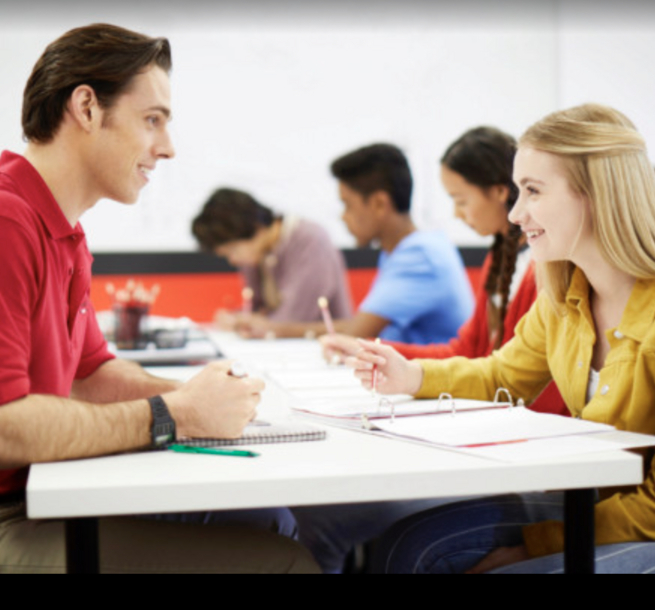 Mathnasium instructor and pupil in classroom