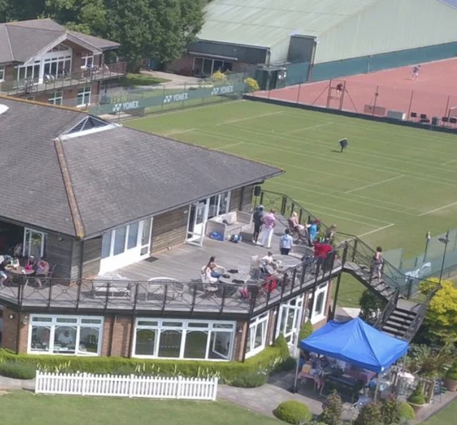 The Wimbledon Club - aerial view of clubhouse and tennis courts