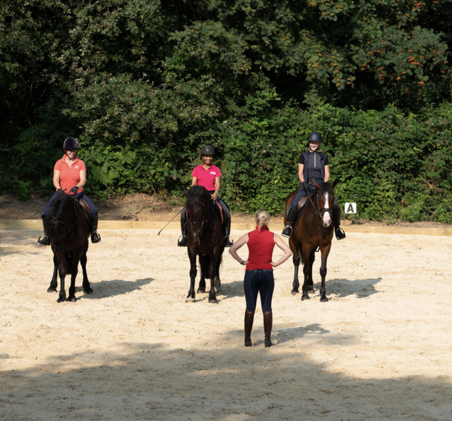 WVS - 3 riders receiving instruction