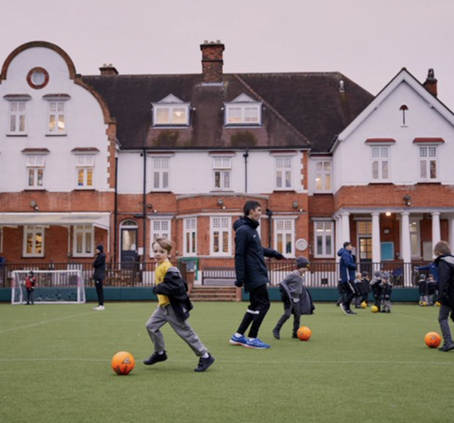 Wimbledon Common Preparatory School - boys in playing field