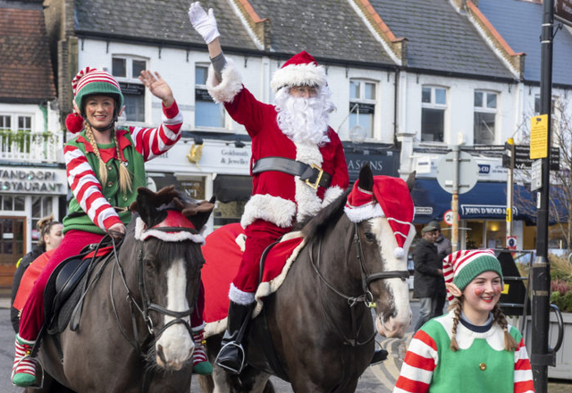 Christmas in the Village - santa and elves horseback parade