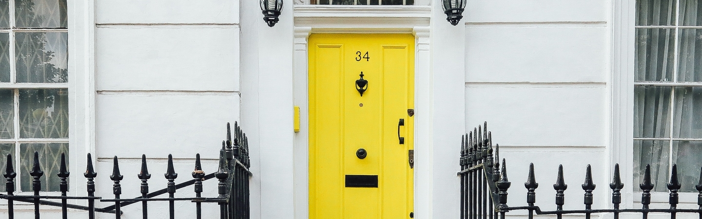 Yellow Front Door on a Townhouse