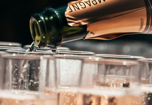 Champagne being poured into glasses