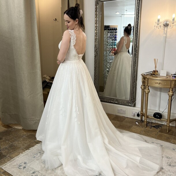 Alterations by Valeria lady in bridal dress